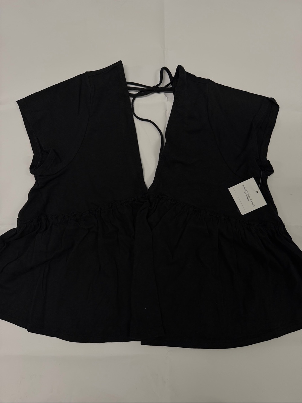 American Eagle Outfitters Black V-Neck Peplum Tie-Back Top